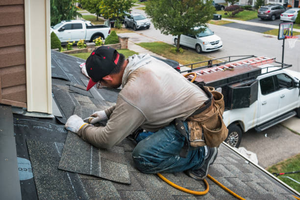 Professional Roofing technician working in North Ferrisburgh, VT